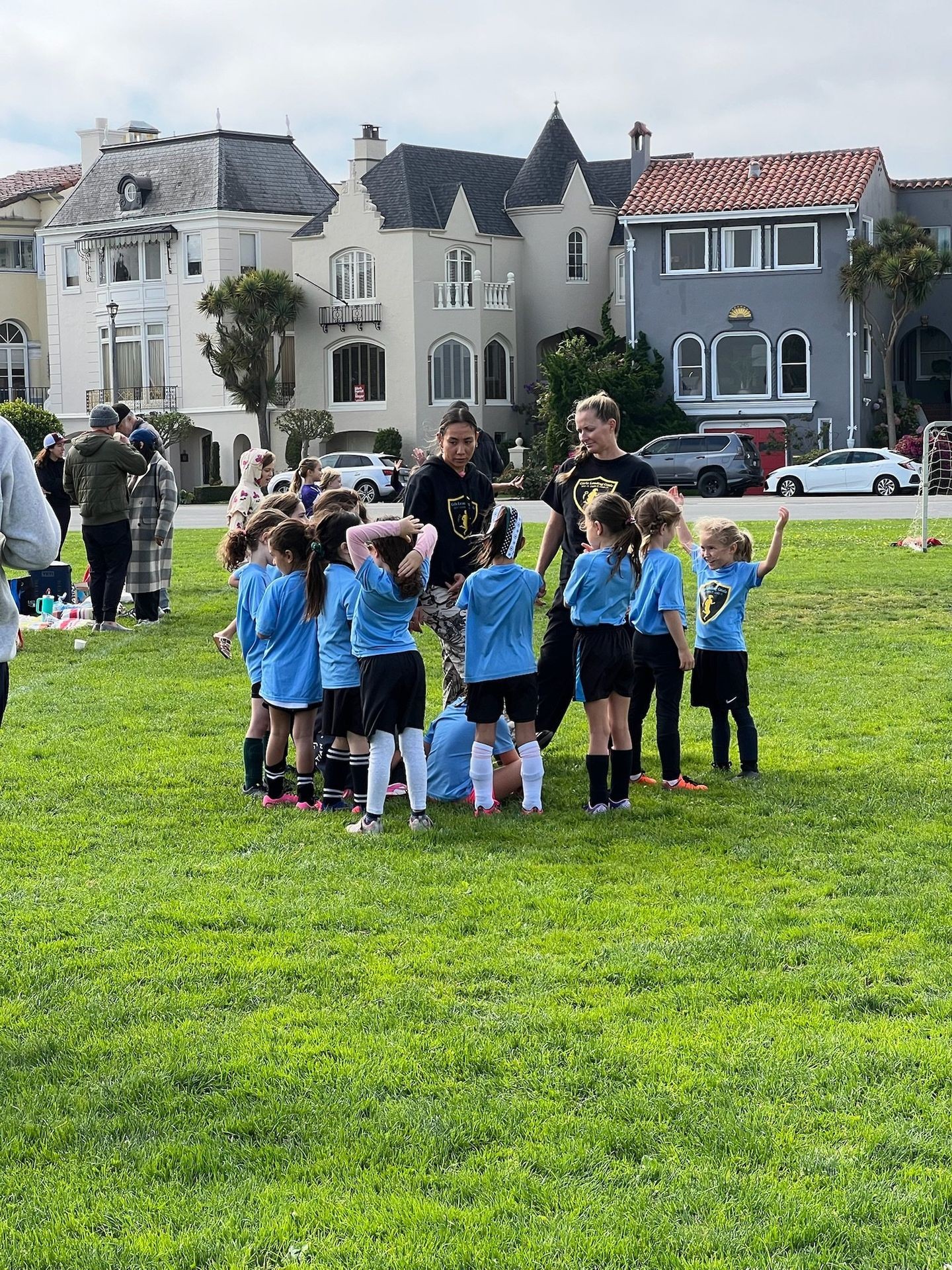 Girls Leading Goals soccer training at a Marina District park in San Francisco.