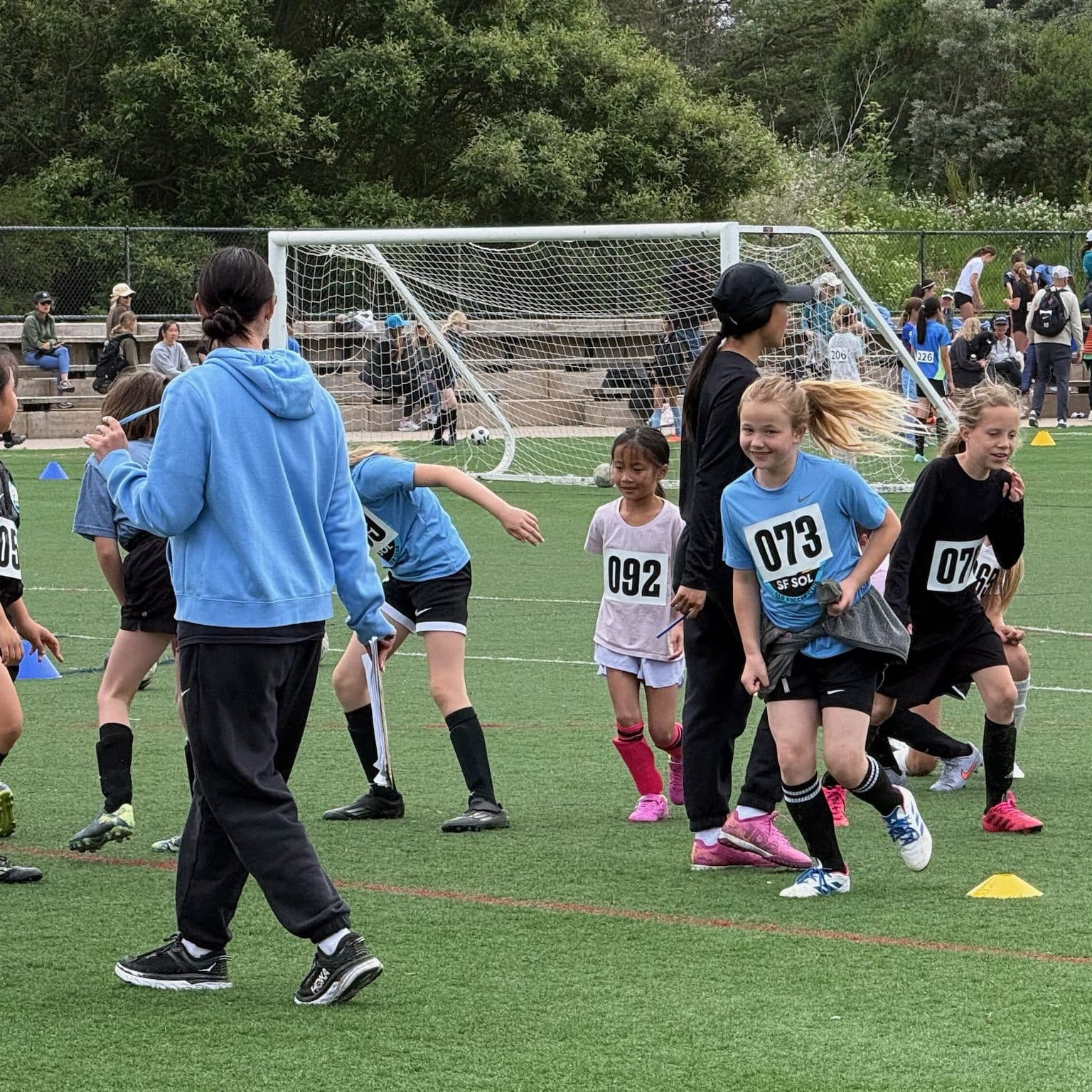Maia Courtois coaching a session on the field